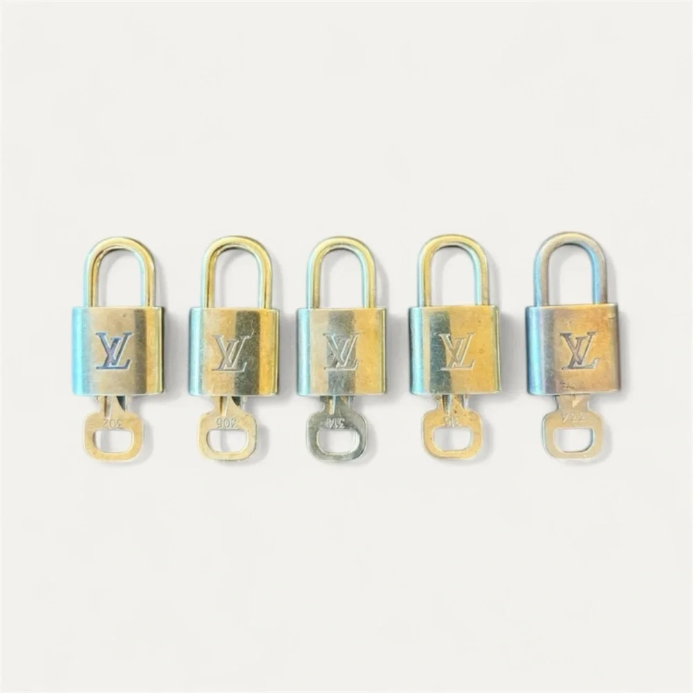 LOUIS VUITTON Authentic Gold Padlock with Key